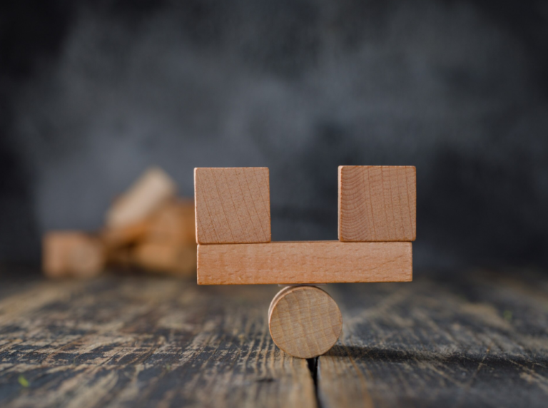 Business and financial accounting concept with wooden blocks side view!